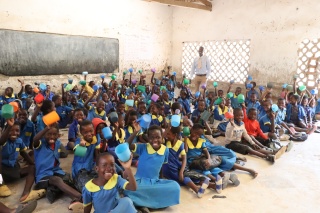 Alexander Lulanga and his classroom of children in Malawi. 