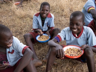 Children in Turkana enjoying Mary's Meals at school.