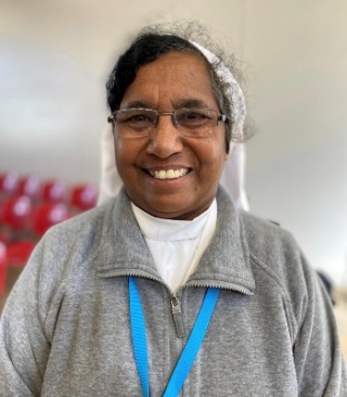 Sister Grace, smiling into camera.