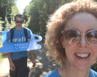 Volunteers on a charity walk taking selfie.