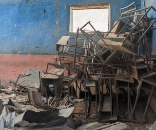 classroom devastated by conflict
