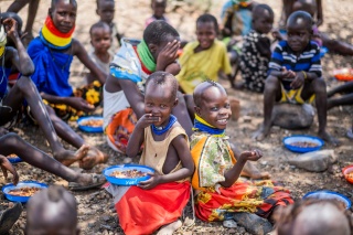 Children eating Mary's Meals