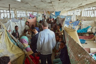 Magnus MacFarlane-Barrow and Sister Medhin visit an IDP camp in Tigray.