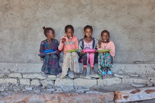 Children enjoying their school meals.