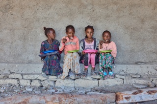 Children enjoying their school meals. 