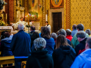 Priest giving mass.