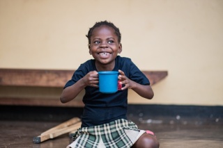 boy eating Mary's Meals