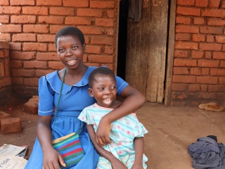 Elise and her family in Malawi