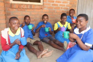 Children eating Mary's Meals in Malawi