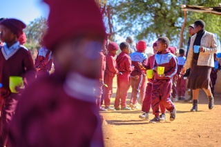 2025 - Zimbabwe - Children receiving porridge
