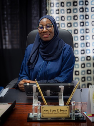 Image of Sona Traore Sesay sitting at her desk.