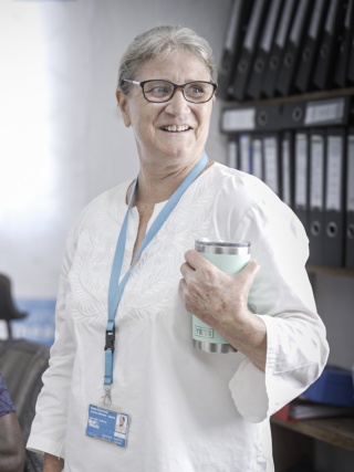 Image of Paula in her office in Liberia.
